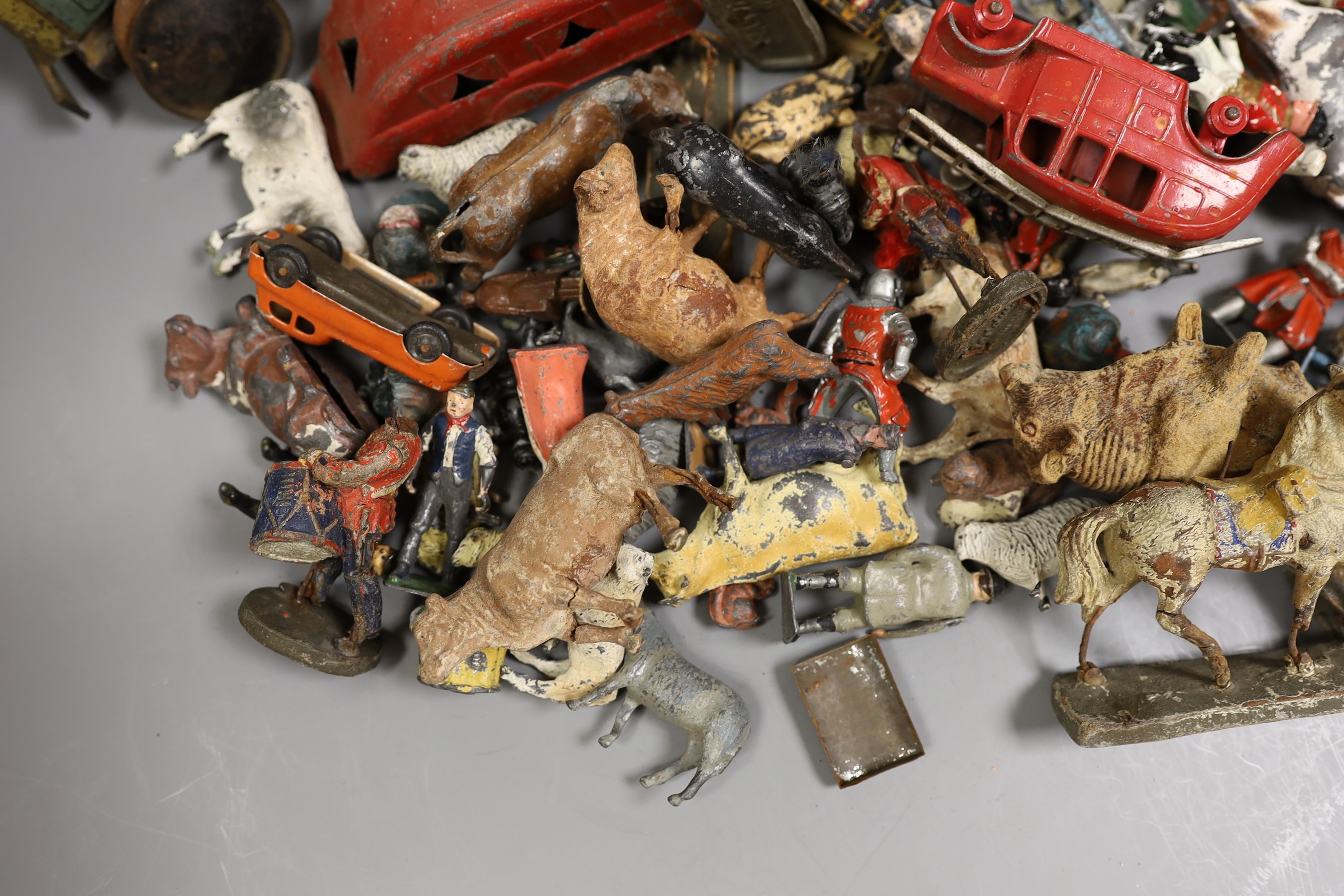 Brenco lithographed tinplate open tourer, and garage, and assorted hollow-cast toys, Elastolic, Dinky Toys, etc.